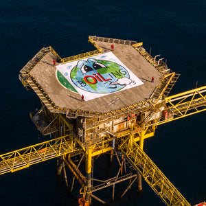 Banner for Greenpeace at occupied oil rig.